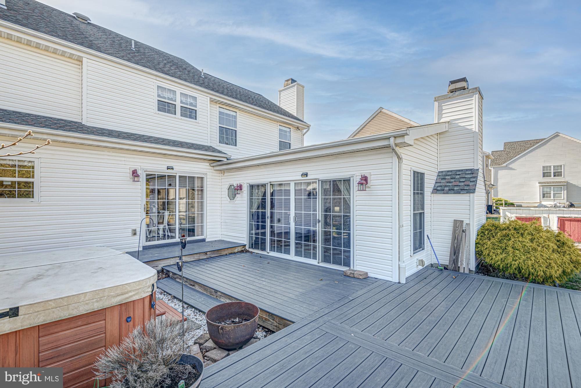 21 Oakview Drive Newark, DE 19702 - Photo 14 of 65 front view of a house with a wooden deck
