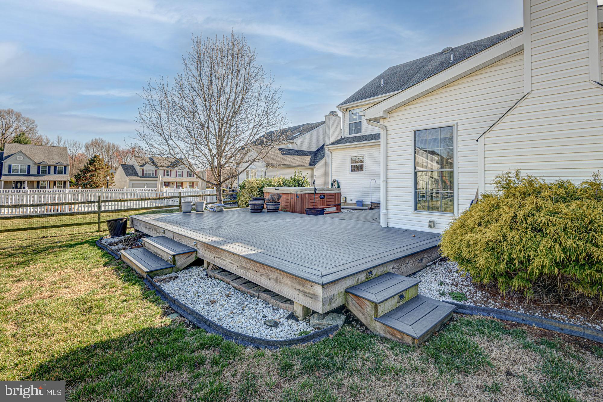 21 Oakview Drive Newark, DE 19702 - Photo 15 of 65 a view of a backyard with plants and a patio