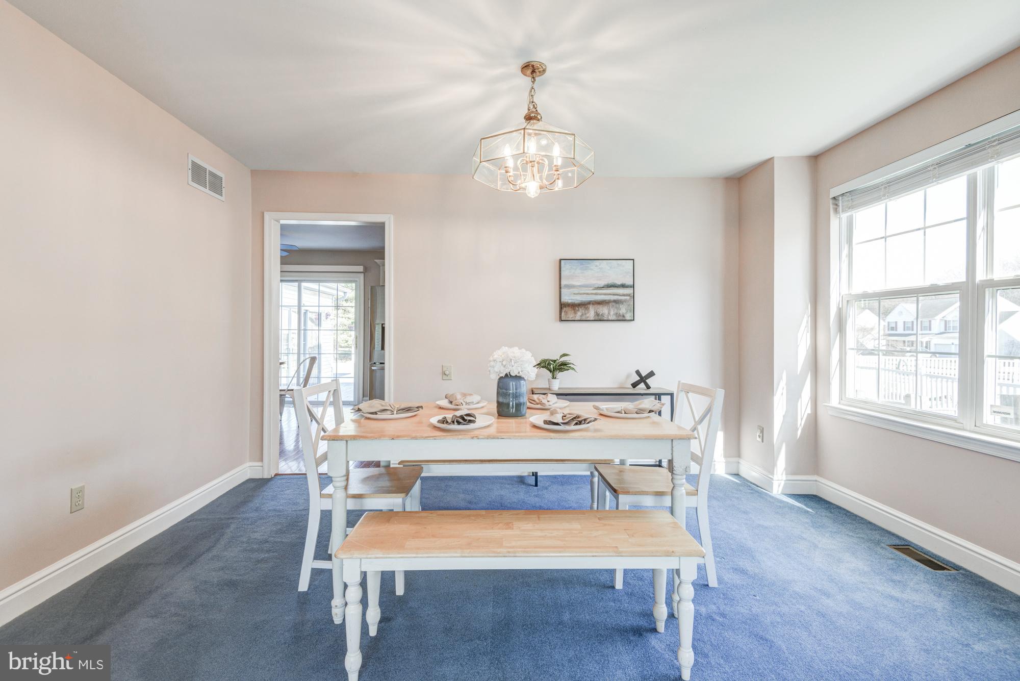 21 Oakview Drive Newark, DE 19702 - Photo 22 of 65 a dining room with wooden floor and a window