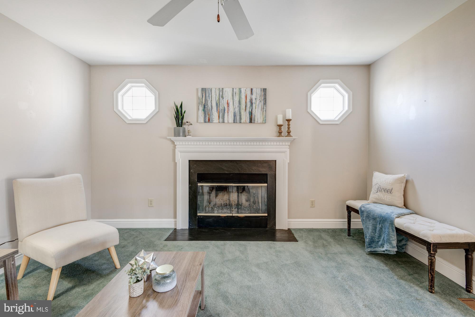 21 Oakview Drive Newark, DE 19702 - Photo 33 of 65 a living room with furniture and a fireplace