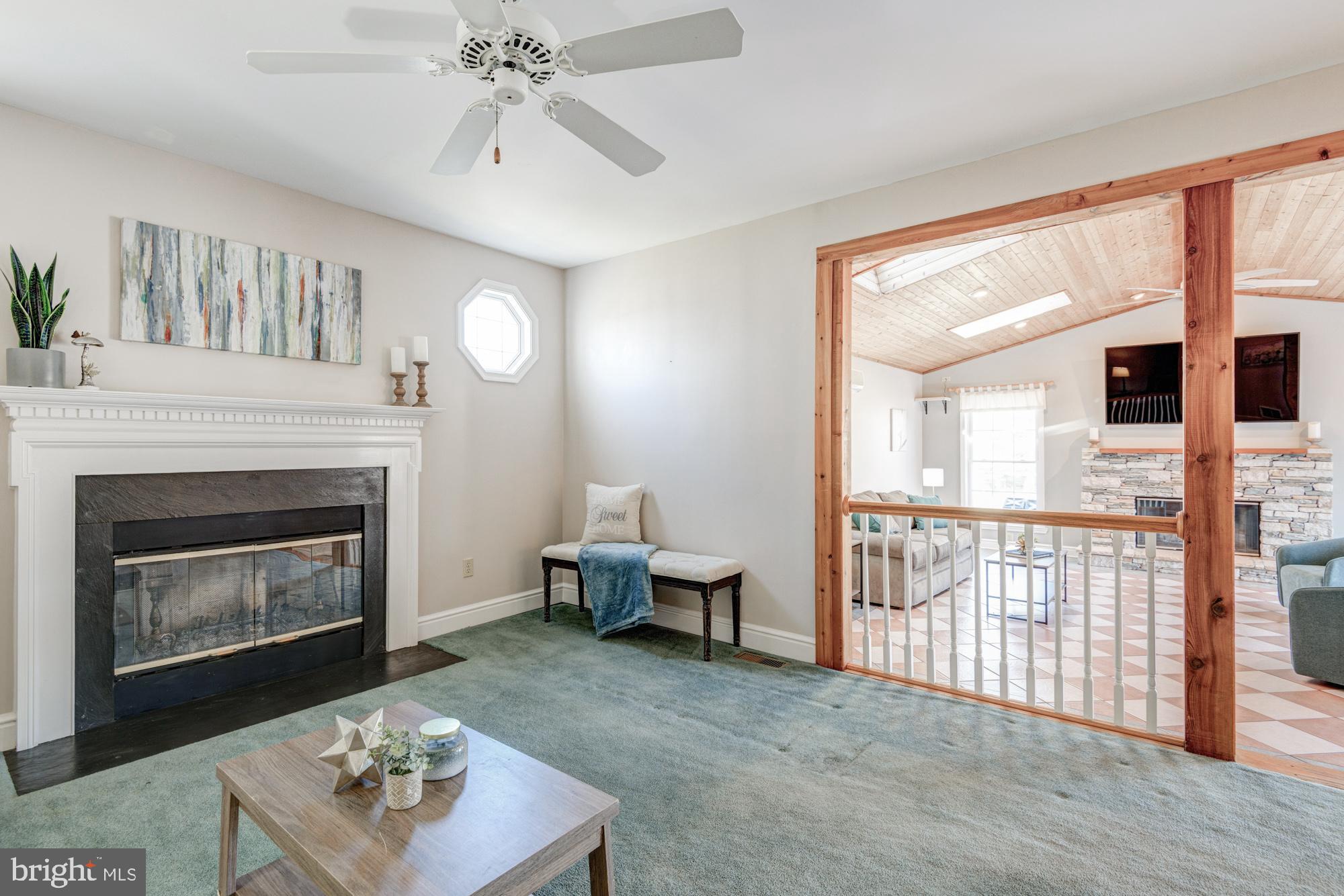 21 Oakview Drive Newark, DE 19702 - Photo 34 of 65 a living room with furniture and a fireplace