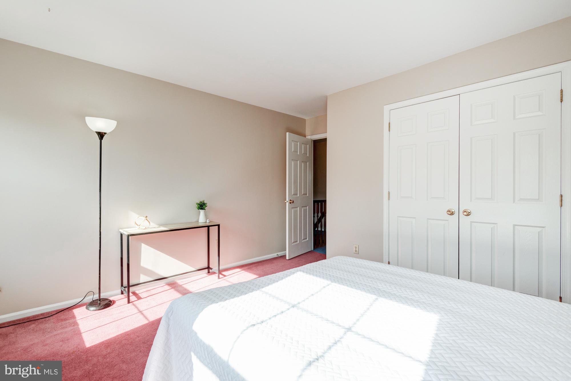 21 Oakview Drive Newark, DE 19702 - Photo 49 of 65 a bedroom with a bed and a dresser