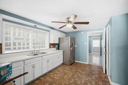 9209 South State Street Chicago, IL 60619 - Photo 16 of 20 a view of a kitchen with a sink