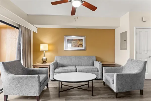 a kitchen with refrigerator cabinets and wooden table