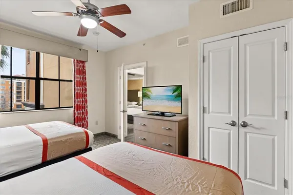 a bathroom with a sink double vanity and a mirror