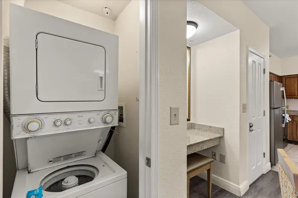 a bathroom with a bathtub and a window