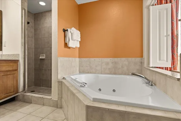 a view of a balcony with a table and chairs