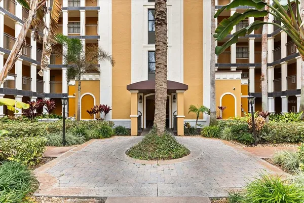 a view of a balcony with sitting area