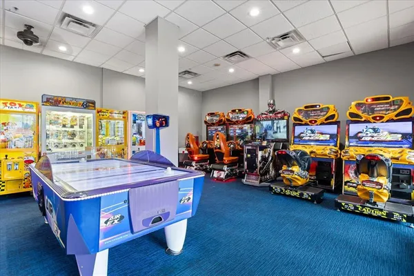 an aerial view of a house with swimming pool