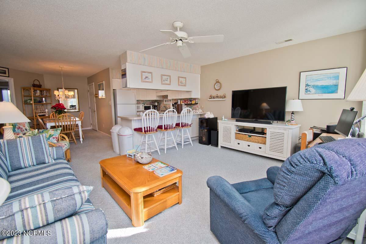 9201 Coast Guard Road, Unit B203 Emerald Isle, NC 28594 - Photo 5 of 37 living room from deck