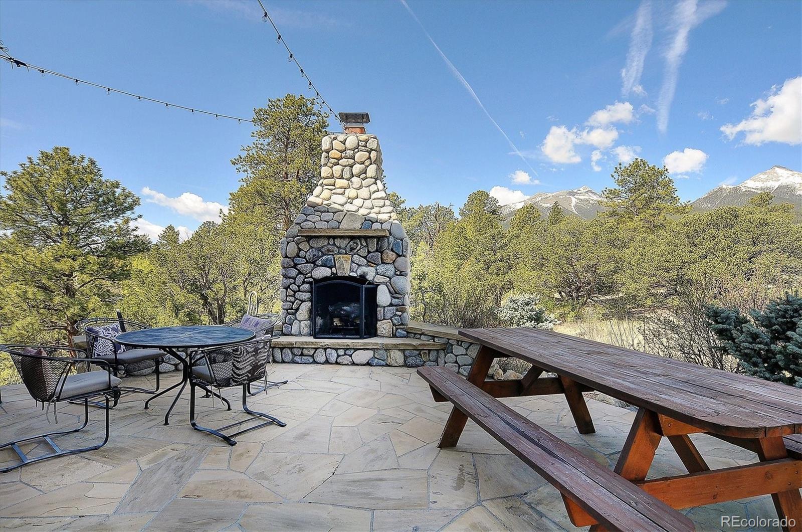 16750 Kiowa Road Salida, CO 81201 - Photo 4 of 50 a roof deck with table and chairs