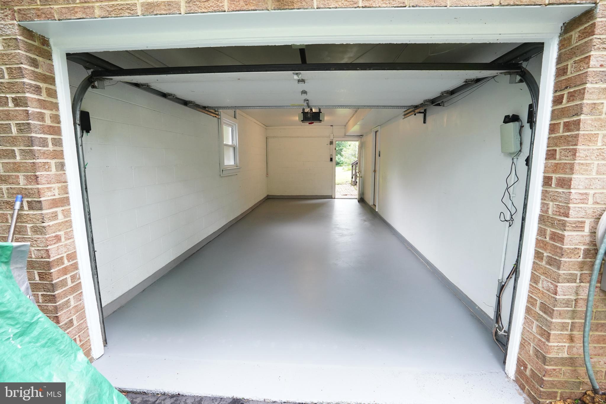 8733 Fort Hunt Road Alexandria, VA 22308 - Photo 12 of 23 Extra long garage, freshly painted floors