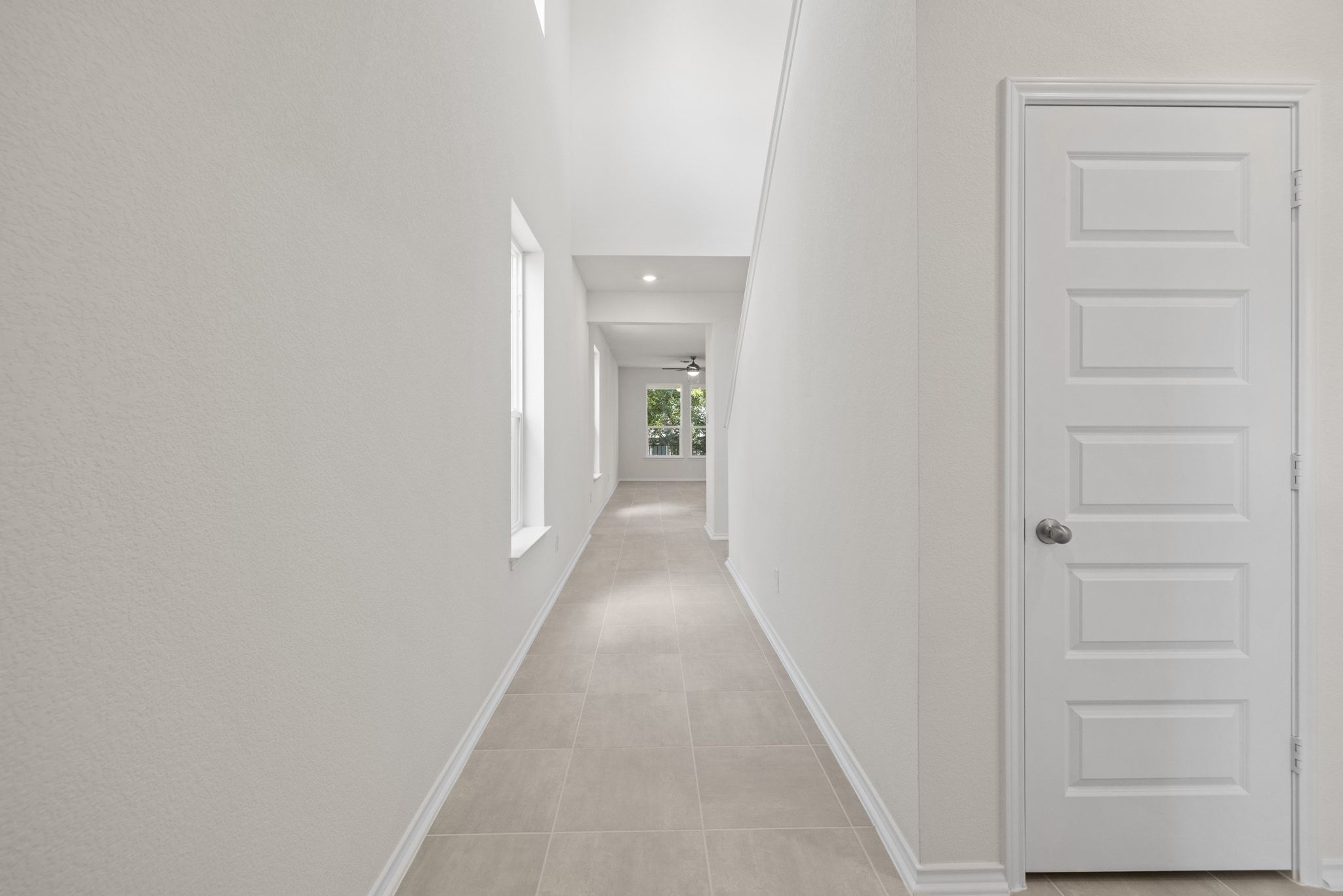 248 Feathers Street Jarrell, TX 76537 - Photo 13 of 32 wooden floor in a hall with closet