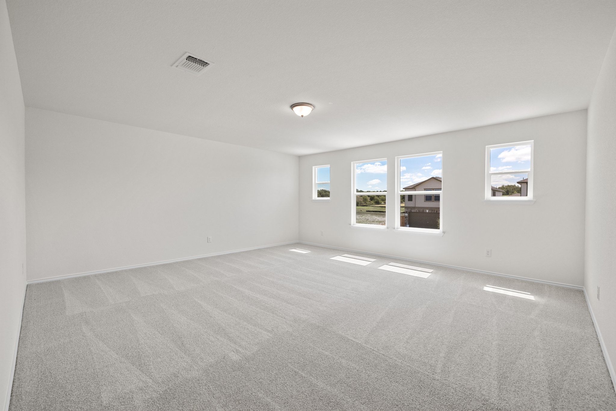 248 Feathers Street Jarrell, TX 76537 - Photo 19 of 32 a view of an empty room with a window