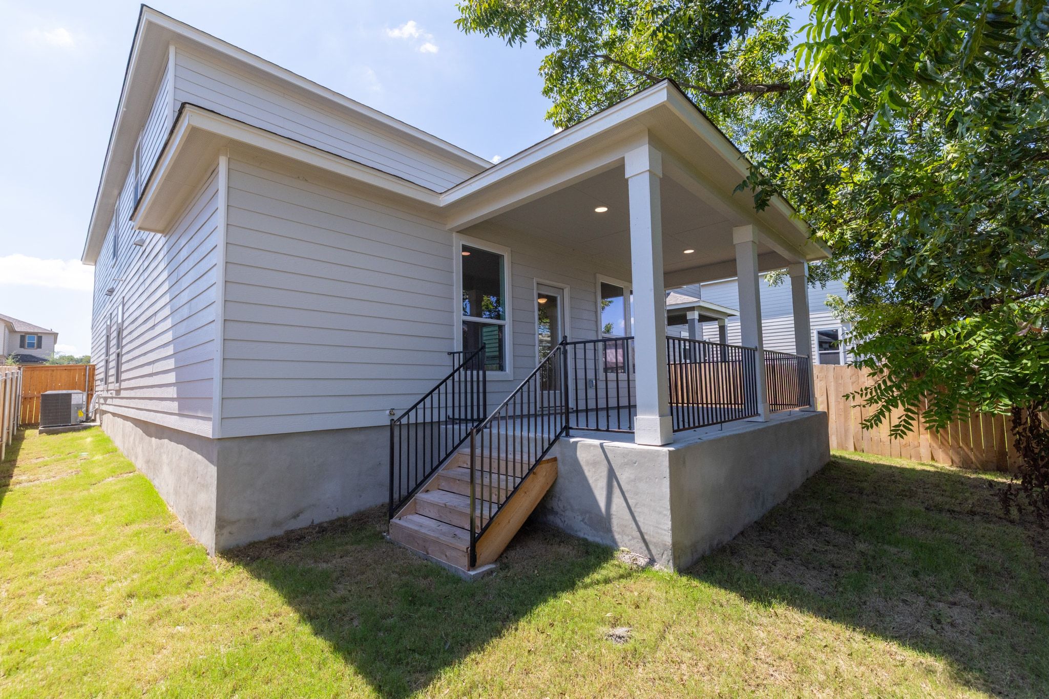 248 Feathers Street Jarrell, TX 76537 - Photo 29 of 32 a view of a house with backyard and sitting area