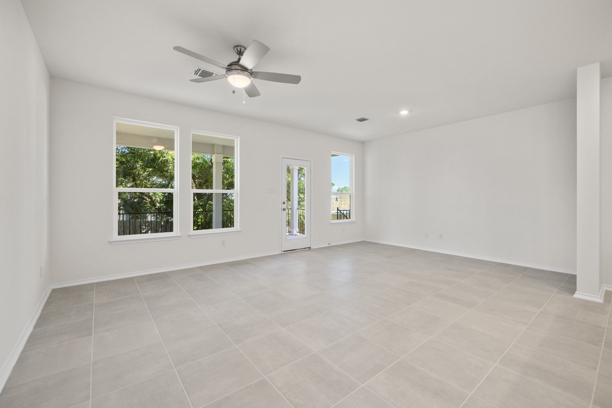 248 Feathers Street Jarrell, TX 76537 - Photo 4 of 32 a view of an empty room with a window