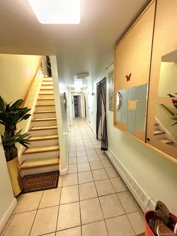 a view of kitchen with sink and furniture