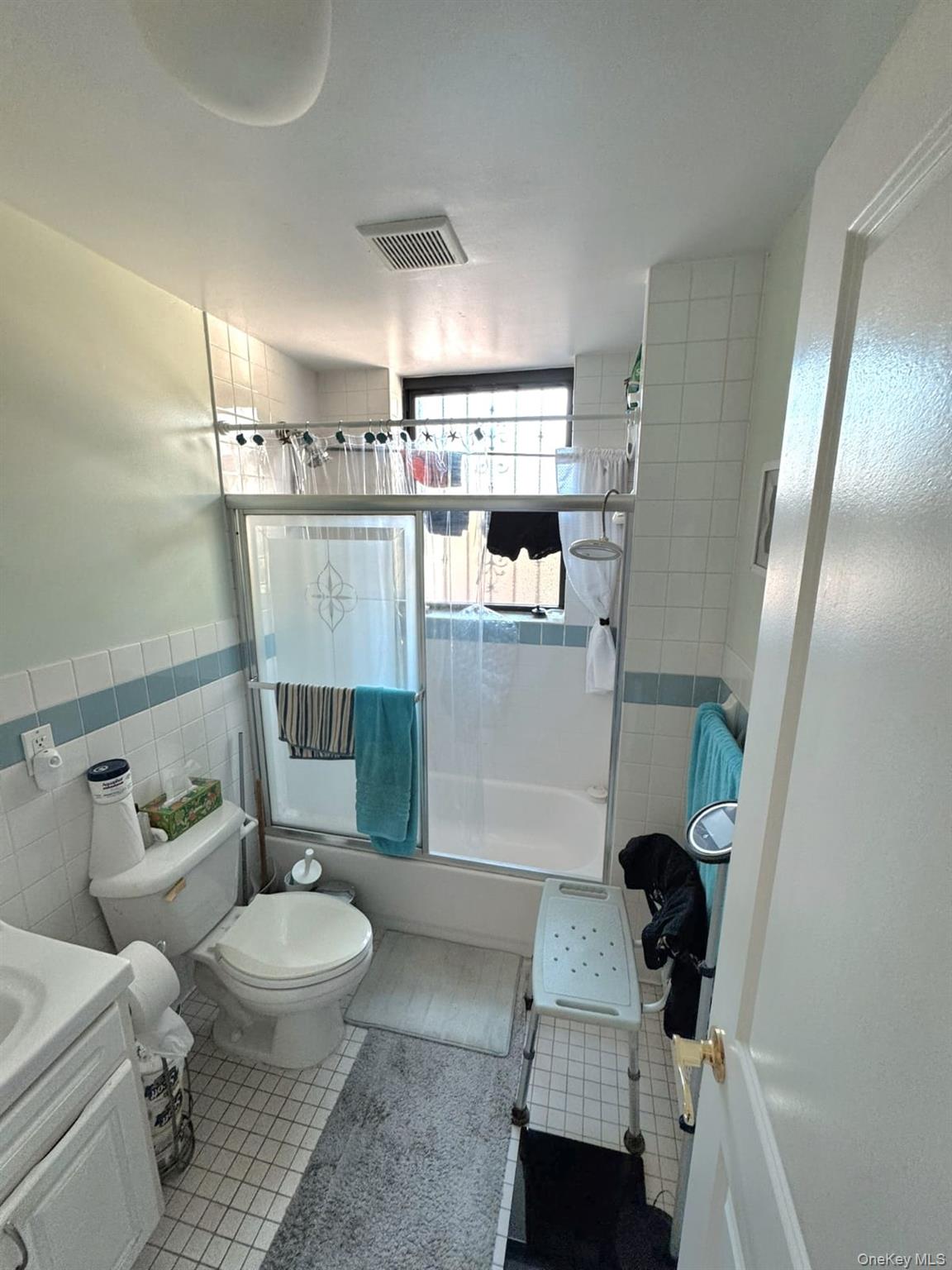 1231 Putnam Avenue Brooklyn, NY 11221 - Photo 16 of 20 a bathroom with a sink toilet and shower