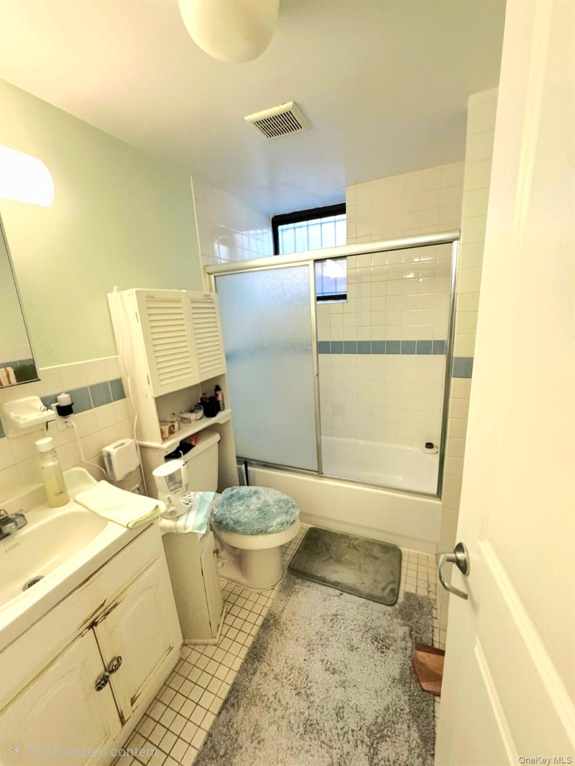 1231 Putnam Avenue Brooklyn, NY 11221 - Photo 19 of 20 a bathroom with a sink toilet and shower
