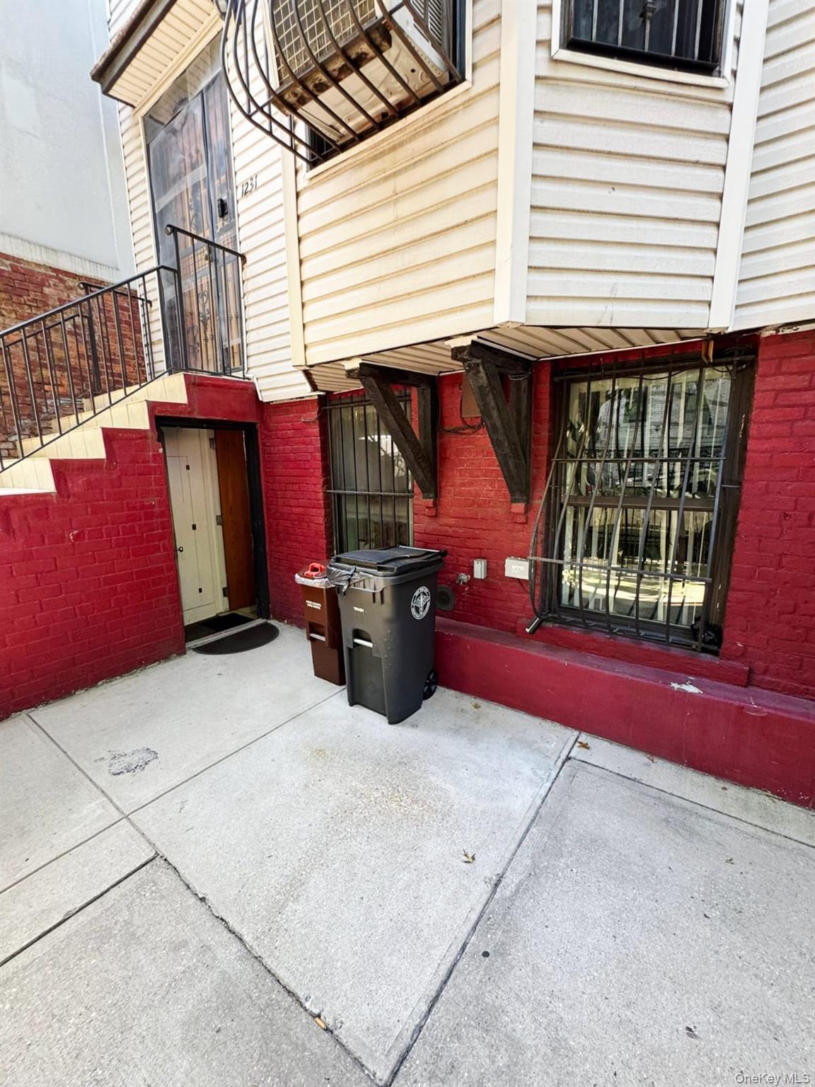 1231 Putnam Avenue Brooklyn, NY 11221 - Photo 4 of 20 a view of a barbeque with wooden roof