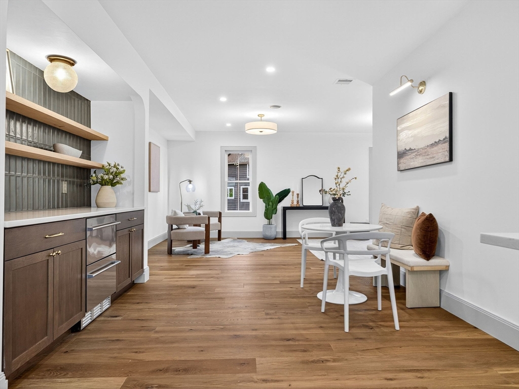 9 Norfolk Road Winchester, MA 01890 - Photo 12 of 42 a living room with furniture and wooden floor