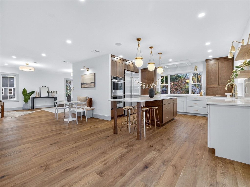 9 Norfolk Road Winchester, MA 01890 - Photo 13 of 42 a view of kitchen with kitchen island and center island