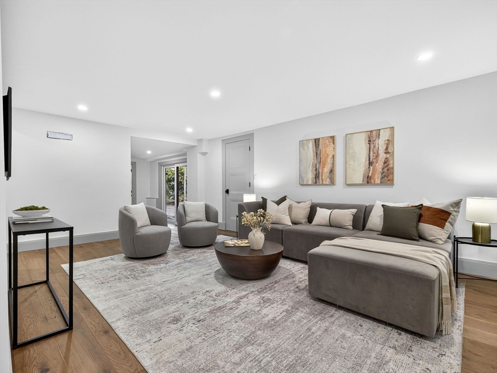 9 Norfolk Road Winchester, MA 01890 - Photo 35 of 42 a living room with furniture a rug and a window