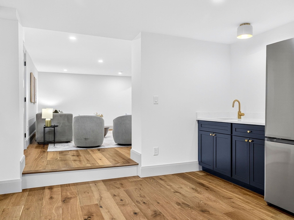 9 Norfolk Road Winchester, MA 01890 - Photo 36 of 42 a living room with a couch