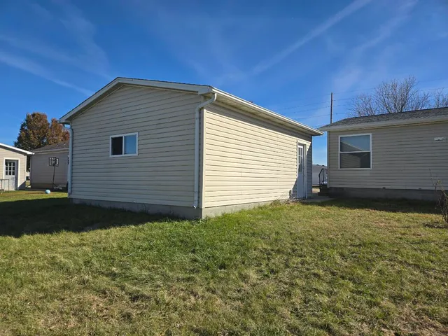 a view of backyard of house