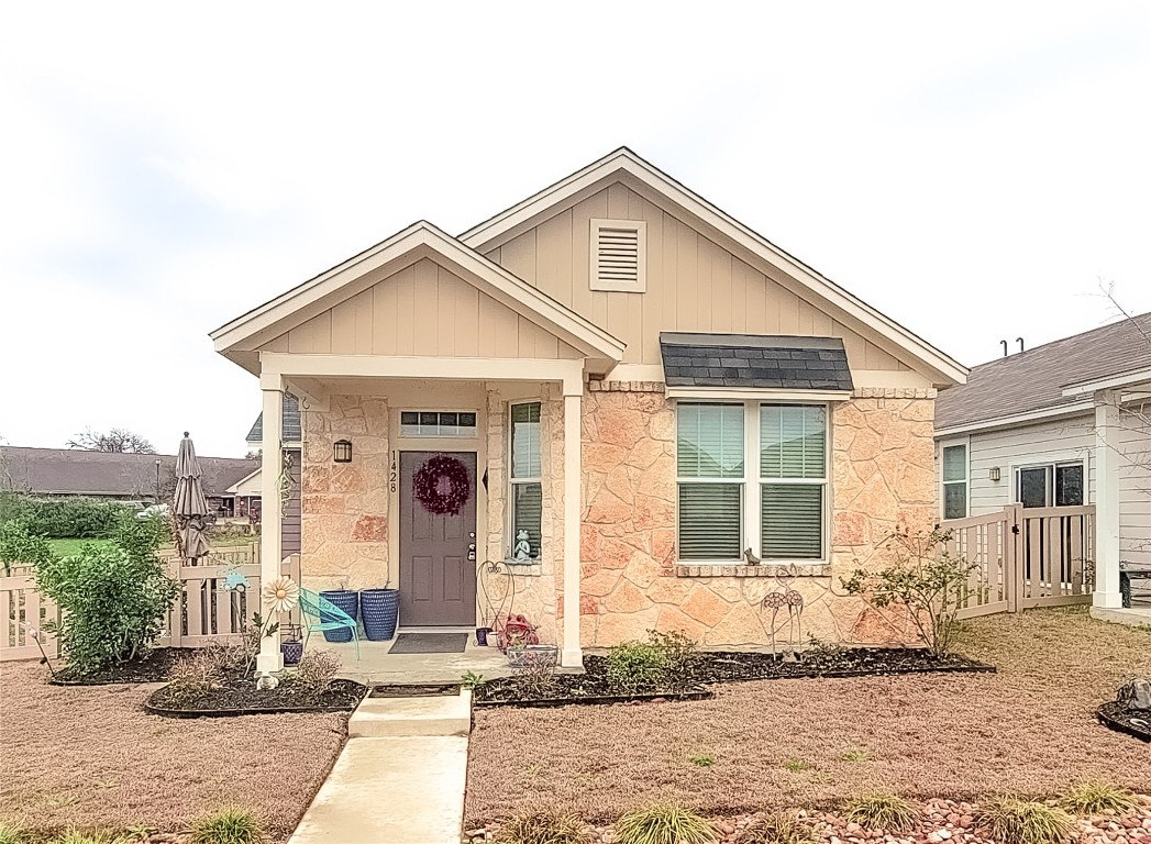 1428 Nevarez Kyle, TX 78640 - Photo 1 of 1 a front view of a house with a yard