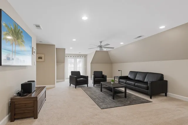 a backyard of a house with seating space