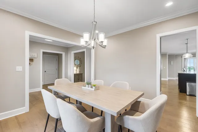 a kitchen with kitchen island appliances cabinets and furniture