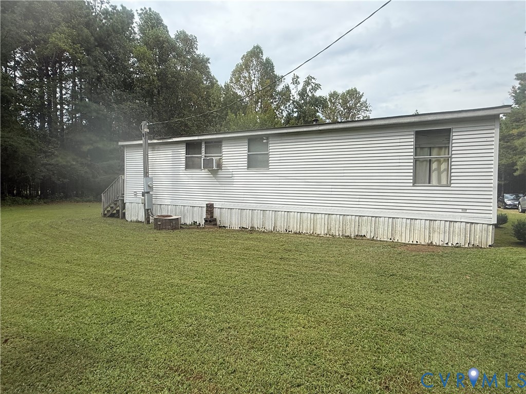 275 Doswell Road Blackstone, VA 23824 - Photo 6 of 9 a view of a backyard of the house