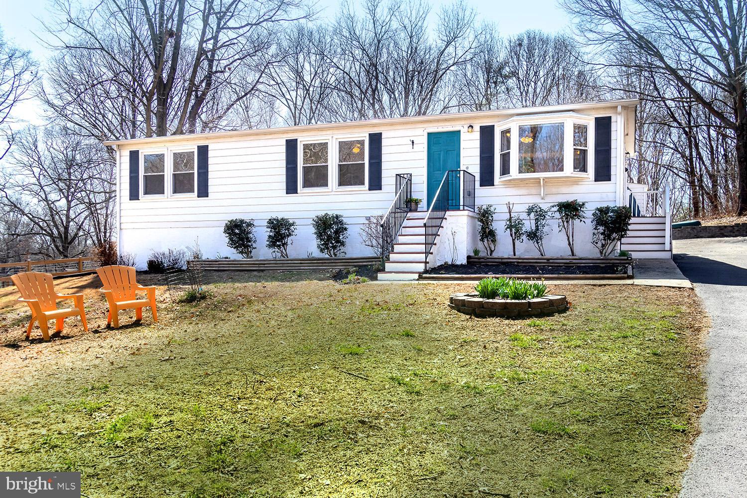949 Hilltop Road Arnold, MD 21012 - Photo 11 of 42 Low-Maintenance Siding Exterior . Landscaped Entry