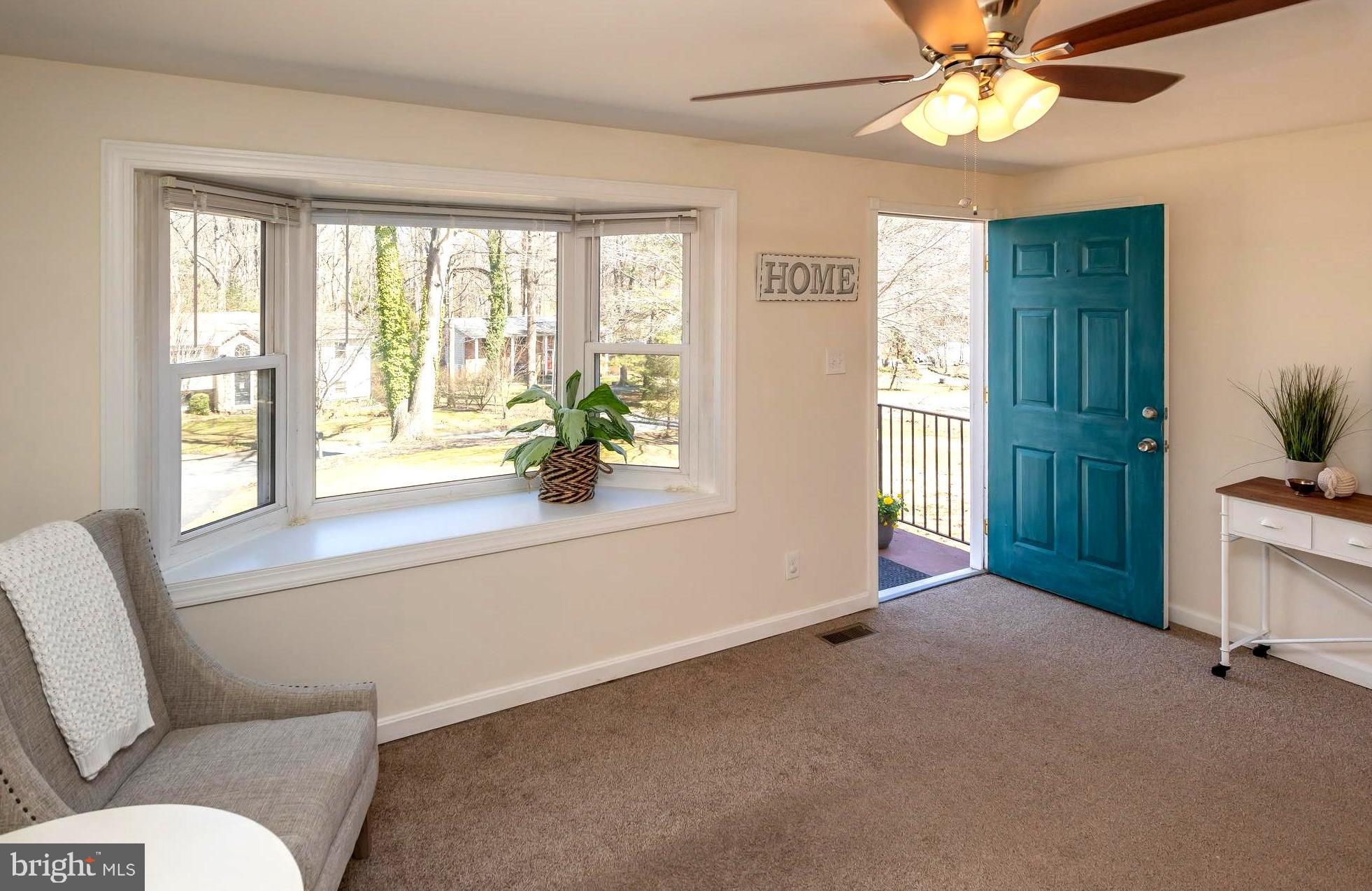 949 Hilltop Road Arnold, MD 21012 - Photo 13 of 42 Living Room with Sunny Bay Window Bumpout