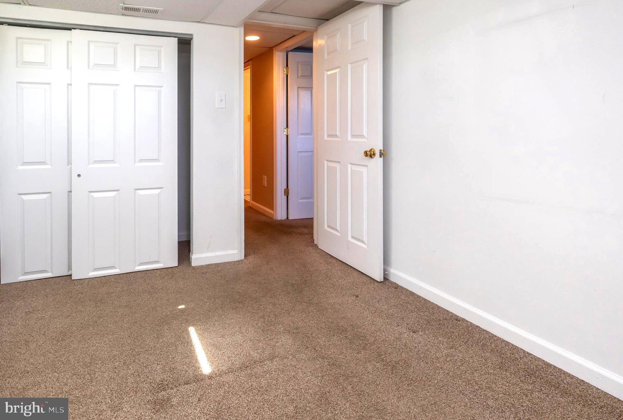 949 Hilltop Road Arnold, MD 21012 - Photo 35 of 42 2nd Lower Level Bedroom with Double Closet