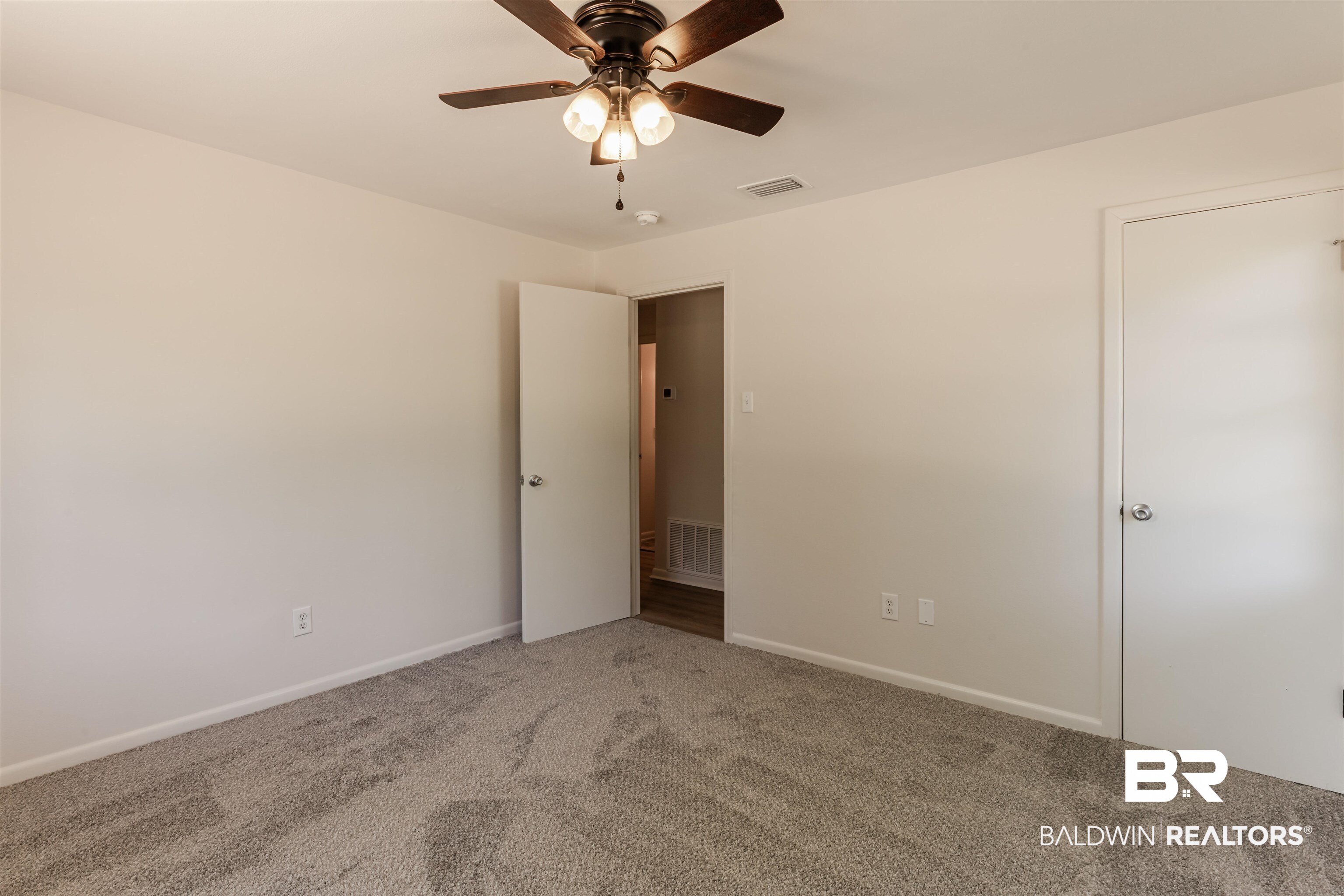 3970 Oak Ridge Avenue Mobile, AL 36619 - Photo 15 of 28 Spare room featuring carpet flooring and ceiling fan