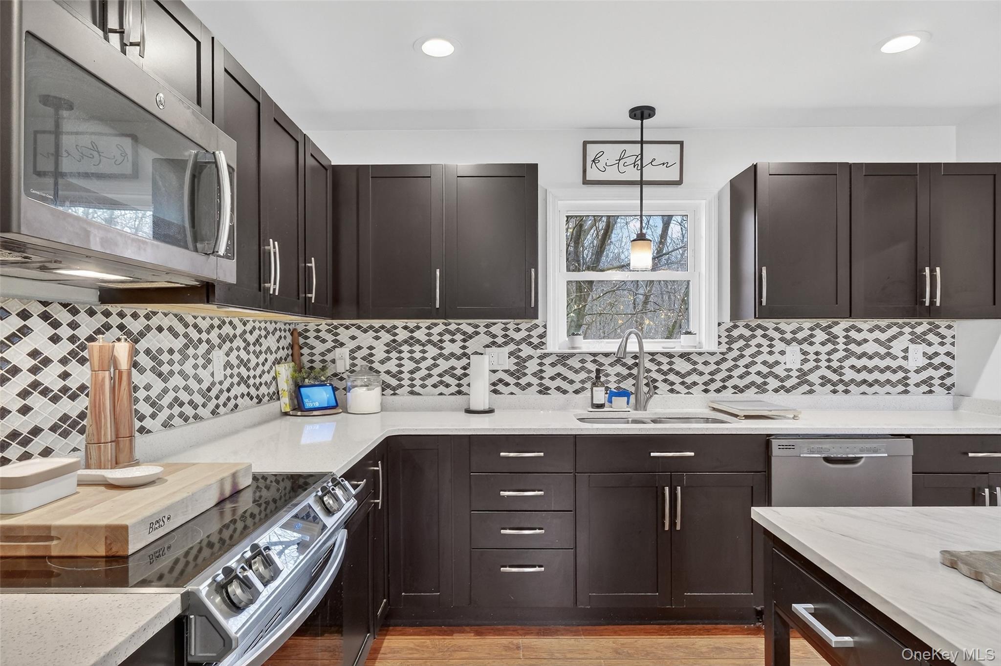 8 Ridge Road Wallkill, NY 12589 - Photo 12 of 48 a kitchen with a sink and a stove
