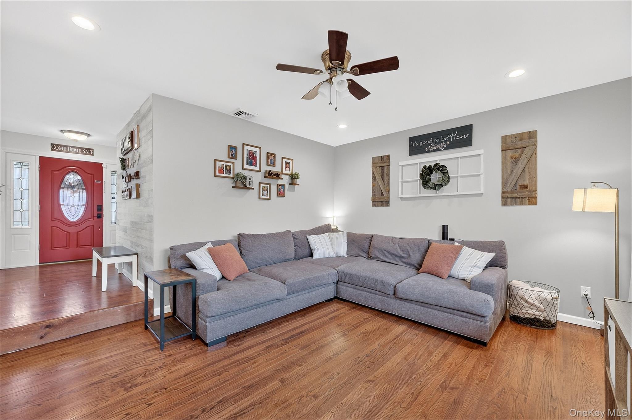 8 Ridge Road Wallkill, NY 12589 - Photo 19 of 48 a living room with furniture and a wooden floor