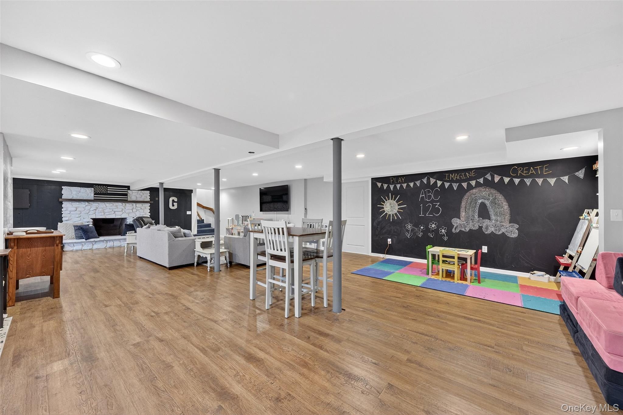 8 Ridge Road Wallkill, NY 12589 - Photo 33 of 48 a living room with furniture and a flat screen tv