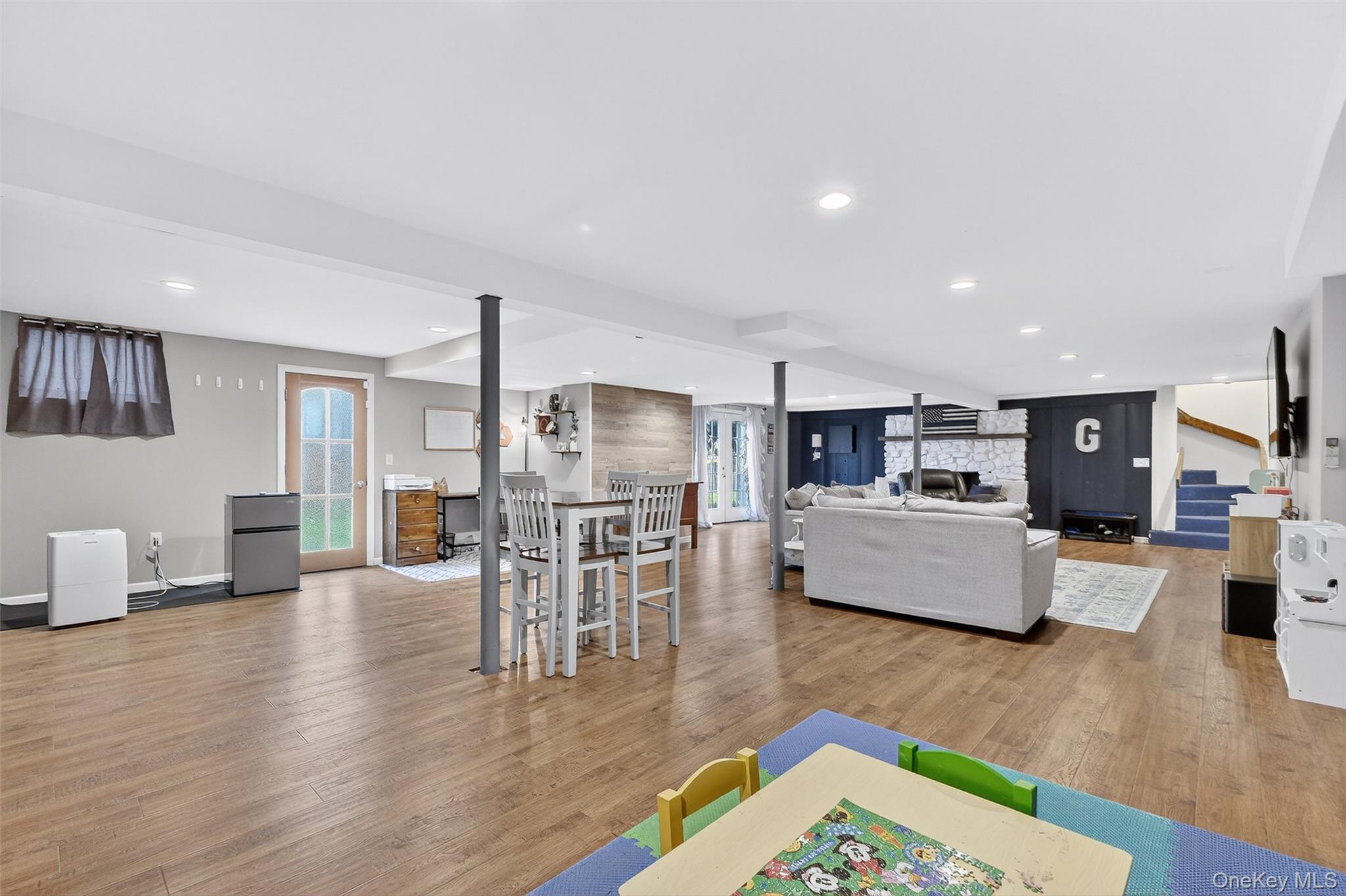 8 Ridge Road Wallkill, NY 12589 - Photo 35 of 48 a living room with furniture and a wooden floor