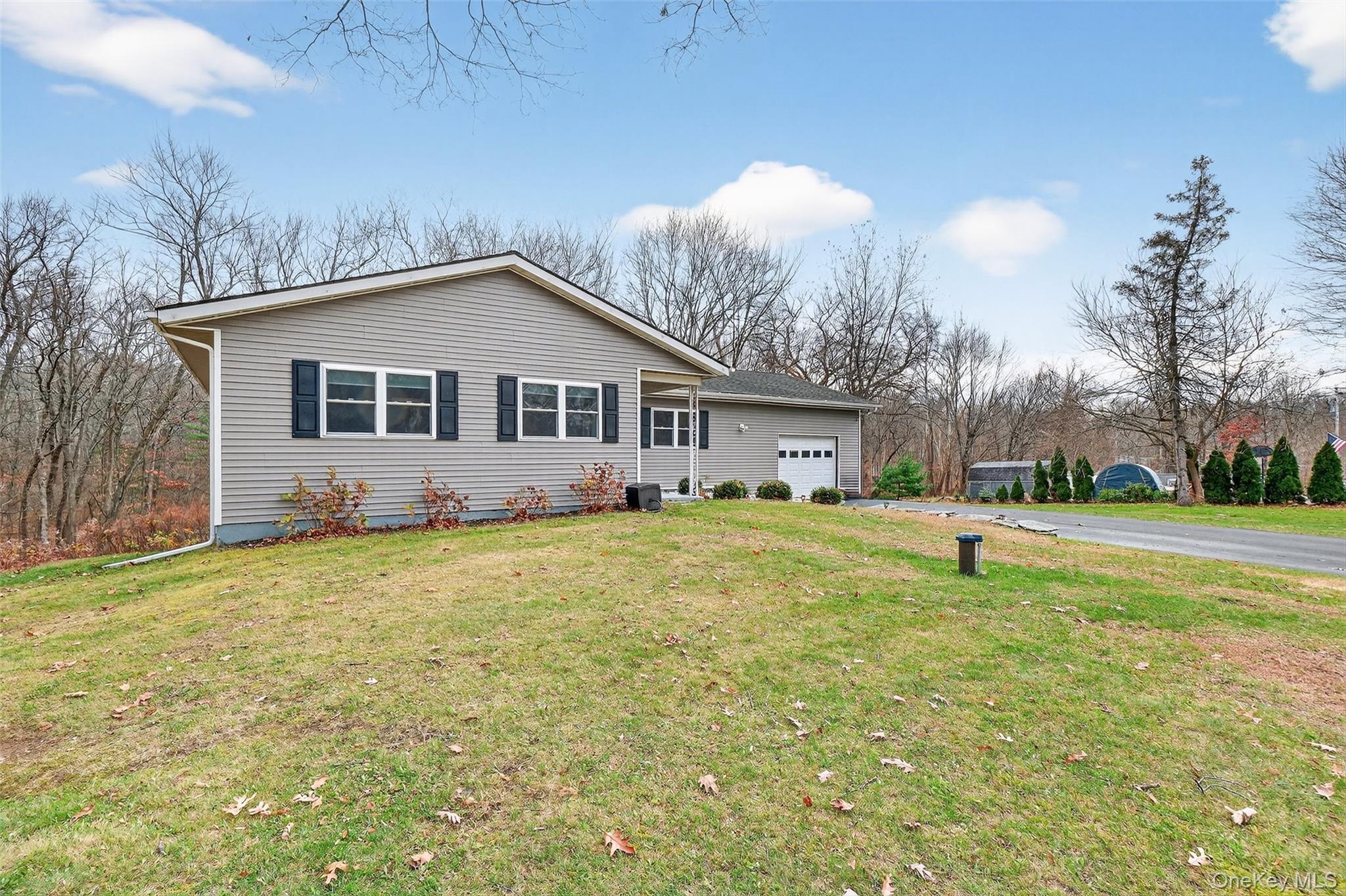 8 Ridge Road Wallkill, NY 12589 - Photo 4 of 48 a view of a house with pool and a yard