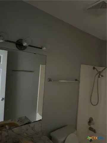 a view of a back yard of the house