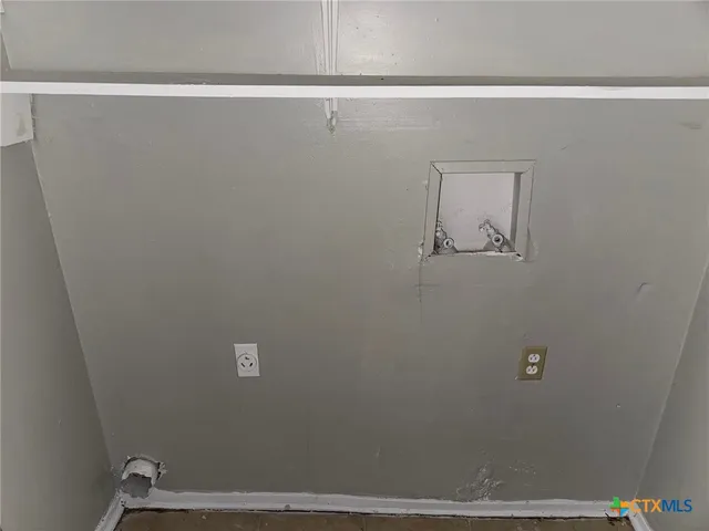 a view of a hallway with closet area