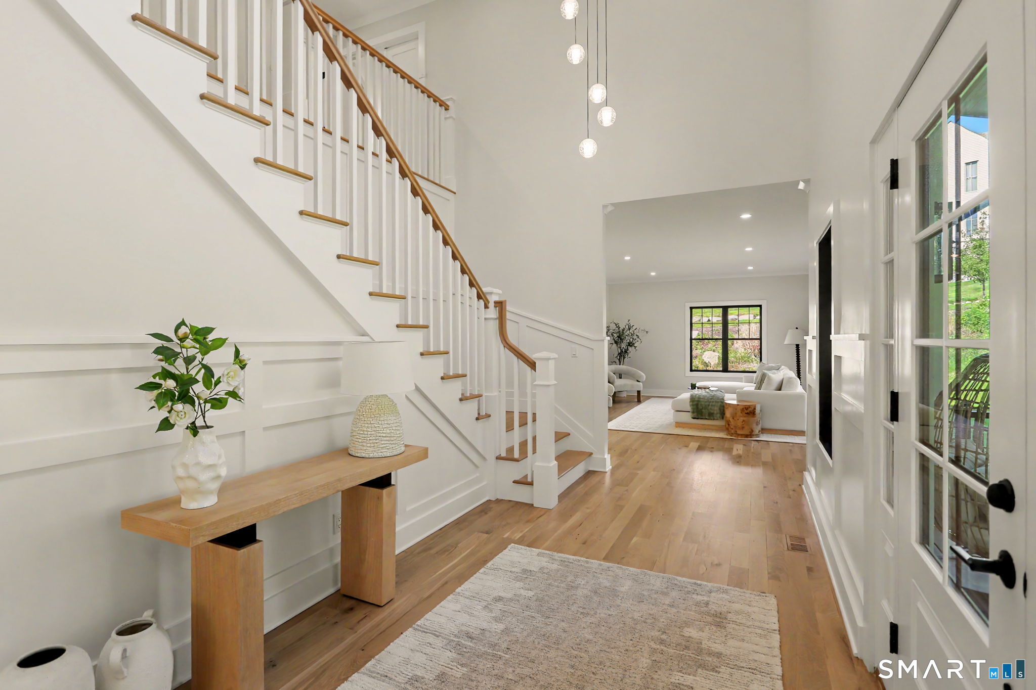 31 Gray Farms Road Stamford, CT 06905 - Photo 5 of 40 a view of entryway and hall with wooden floor