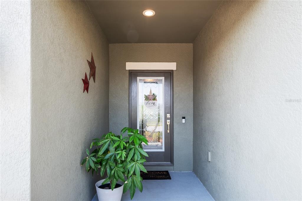 19041 Alfaro Loop Spring Hill, FL 34610 - Photo 2 of 39 a hallway with a window