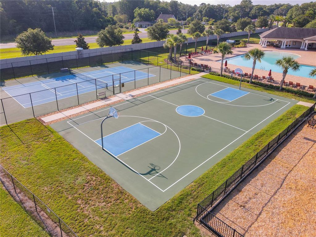 19041 Alfaro Loop Spring Hill, FL 34610 - Photo 35 of 39 a view of a tennis court