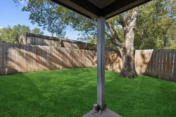 a view of a backyard with a garden