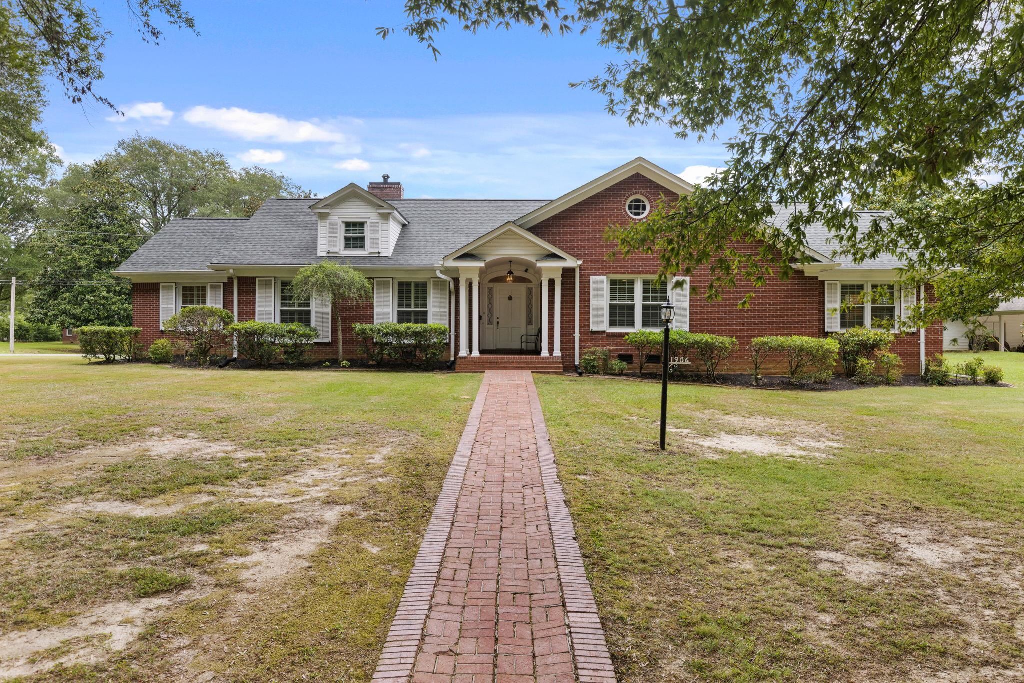 1906 Willow Road Corinth, MS 38834 - Photo 1 of 40 a front view of house with yard and green space
