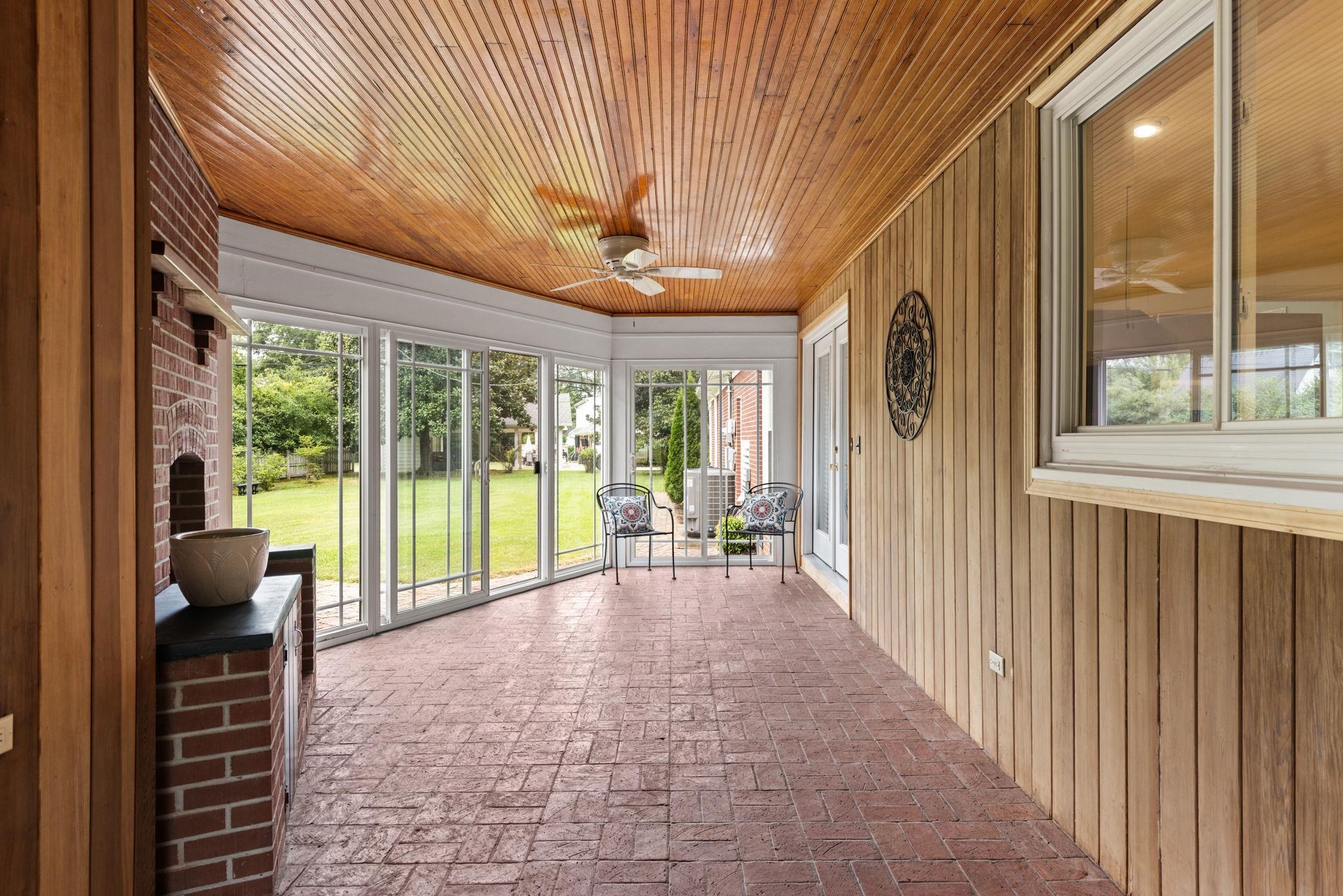 1906 Willow Road Corinth, MS 38834 - Photo 16 of 40 a view of a porch with furniture and garden